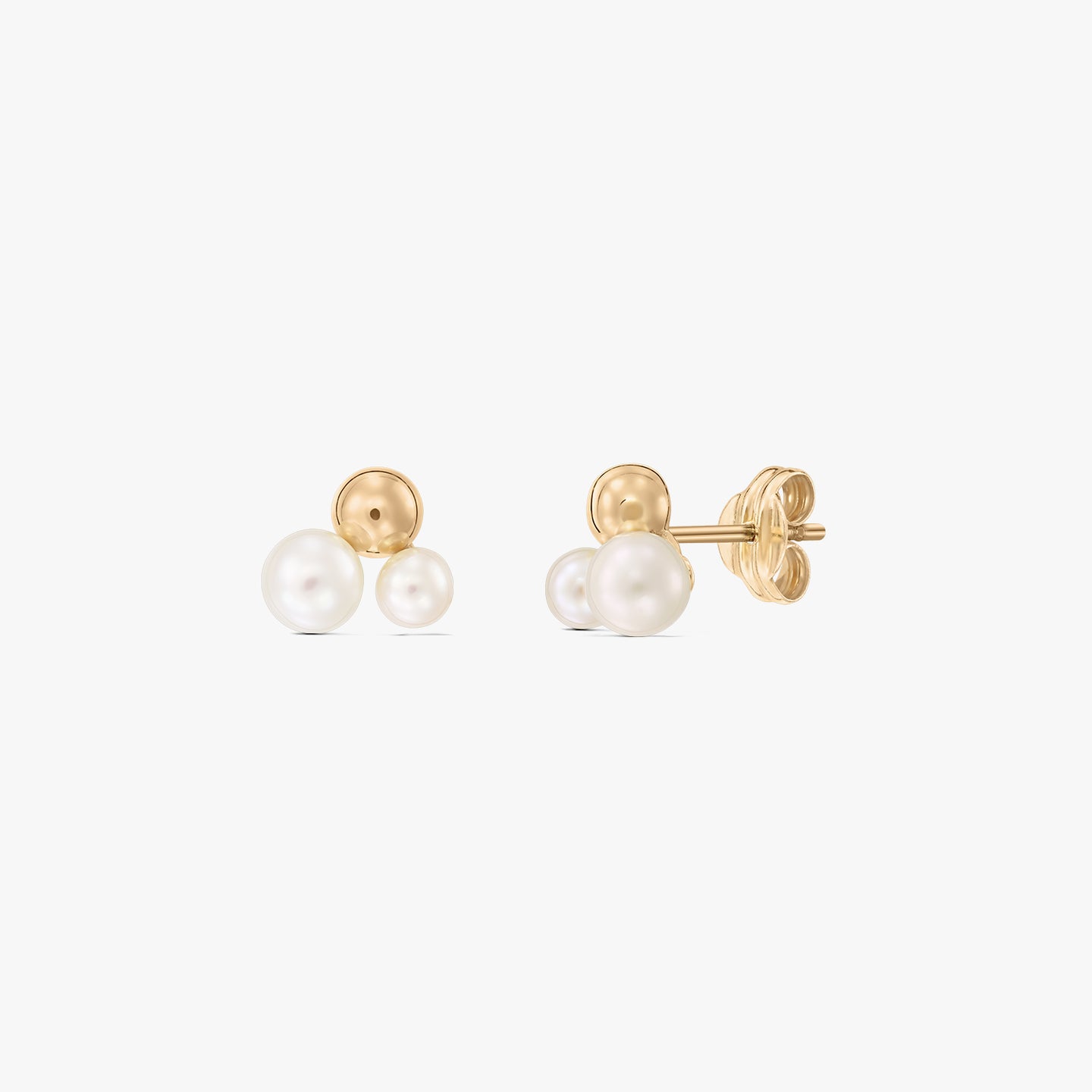 Pair of 14K yellow gold double pearl stud earrings with butterfly backs on a white background.