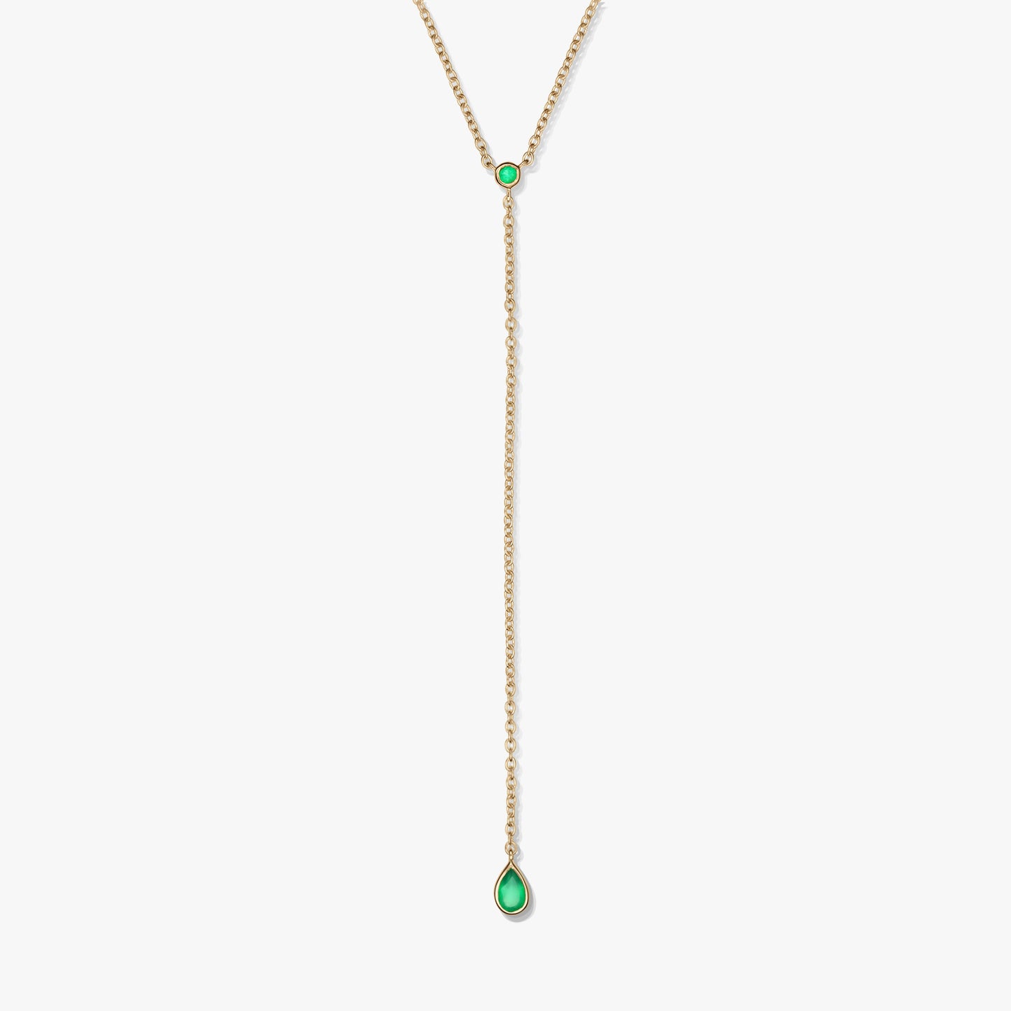 Elegant gold-plated sterling silver lariat necklace with green onyx accents and a teardrop drop pendant, photographed on a white background.