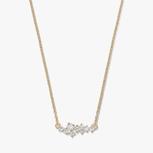 Elegant Golden Constellation silver necklace featuring a delicate chain and a starry cluster of clear stones, photographed on a white background.