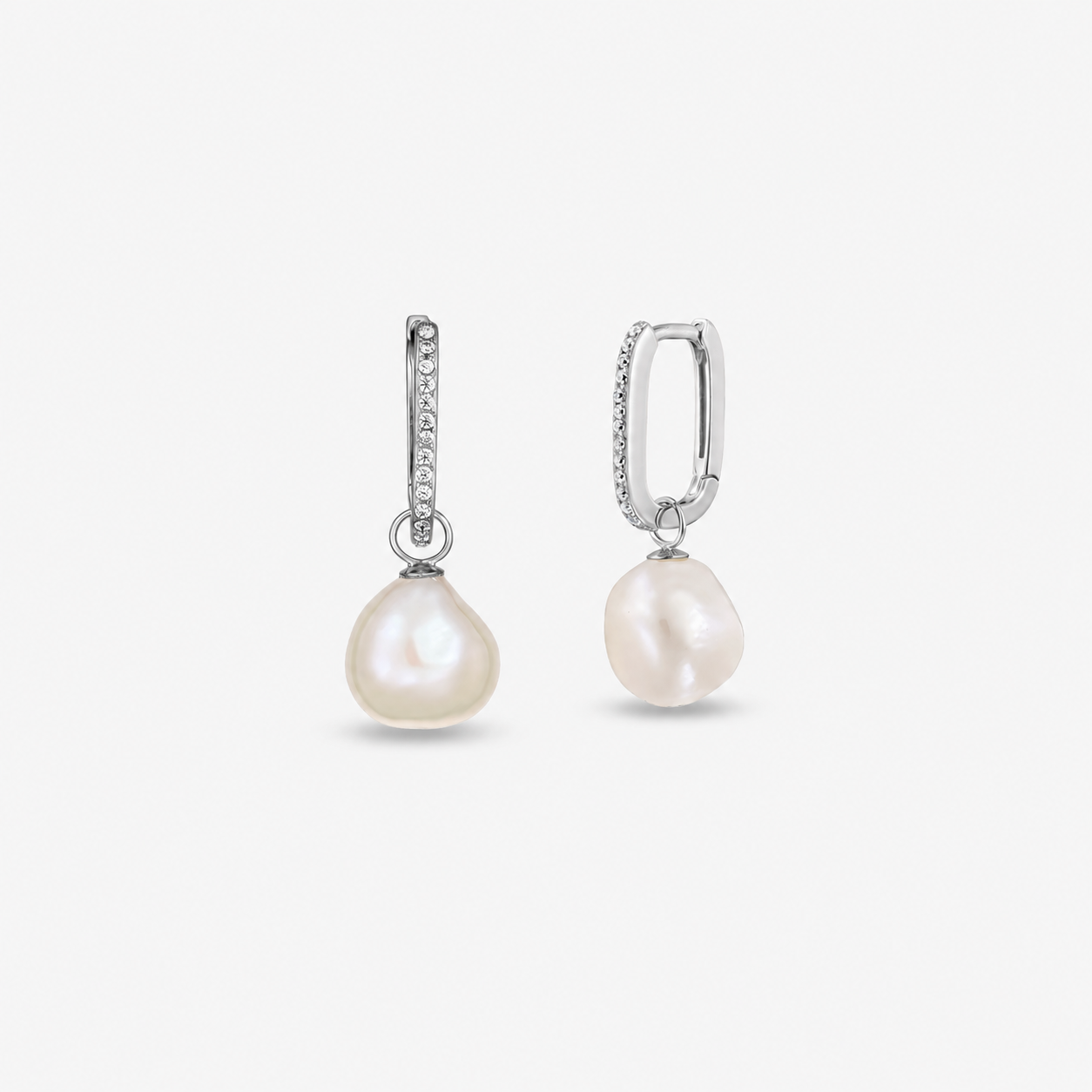 Sterling silver hoop drop earrings with pavé zirconia and natural baroque freshwater pearls on a white background.