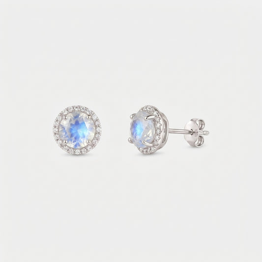 Pair of Keira moonstone halo stud earrings in 925 sterling silver, shown front and side with butterfly backs on a white background.
