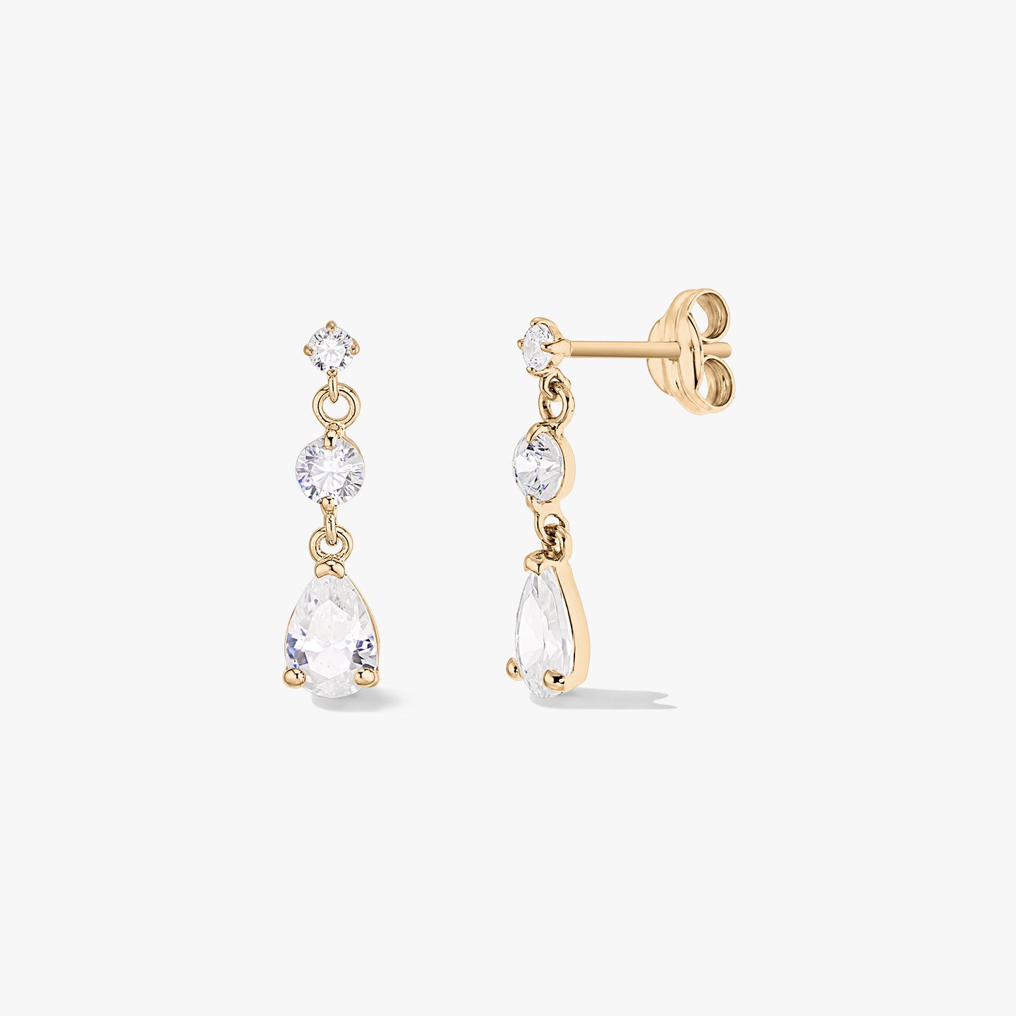 Pair of 14K yellow gold raindrop earrings with three white zirconia stones (round and pear-cut), shown front and side on a white background.