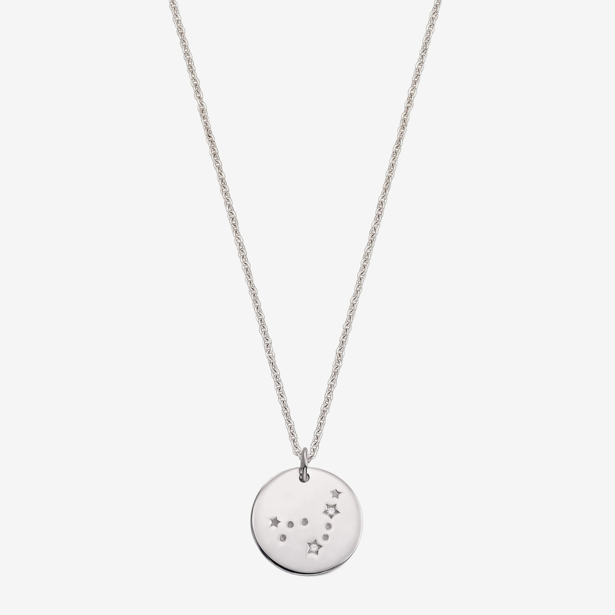 Delicate 925 sterling silver Capricorn zodiac disc pendant necklace with white sapphire accents, photographed on a white background.
