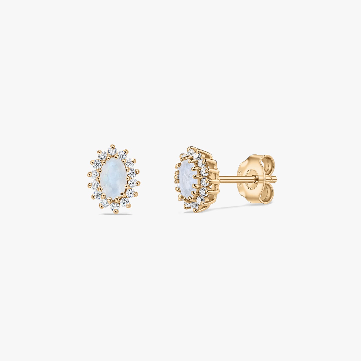 Pair of gold‑plated sterling silver stud earrings with oval moonstone centers and a halo of small white stones, shown on a white background in front and side views.