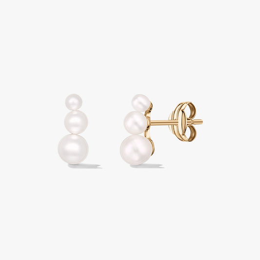 Elegant gold stud earrings, each set with three graduated white pearls, shown front and side on a white background.