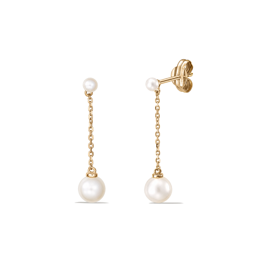 Pair of Sia gold chain drop earrings with small white cultured pearls by Indira, displayed on a transparent background.