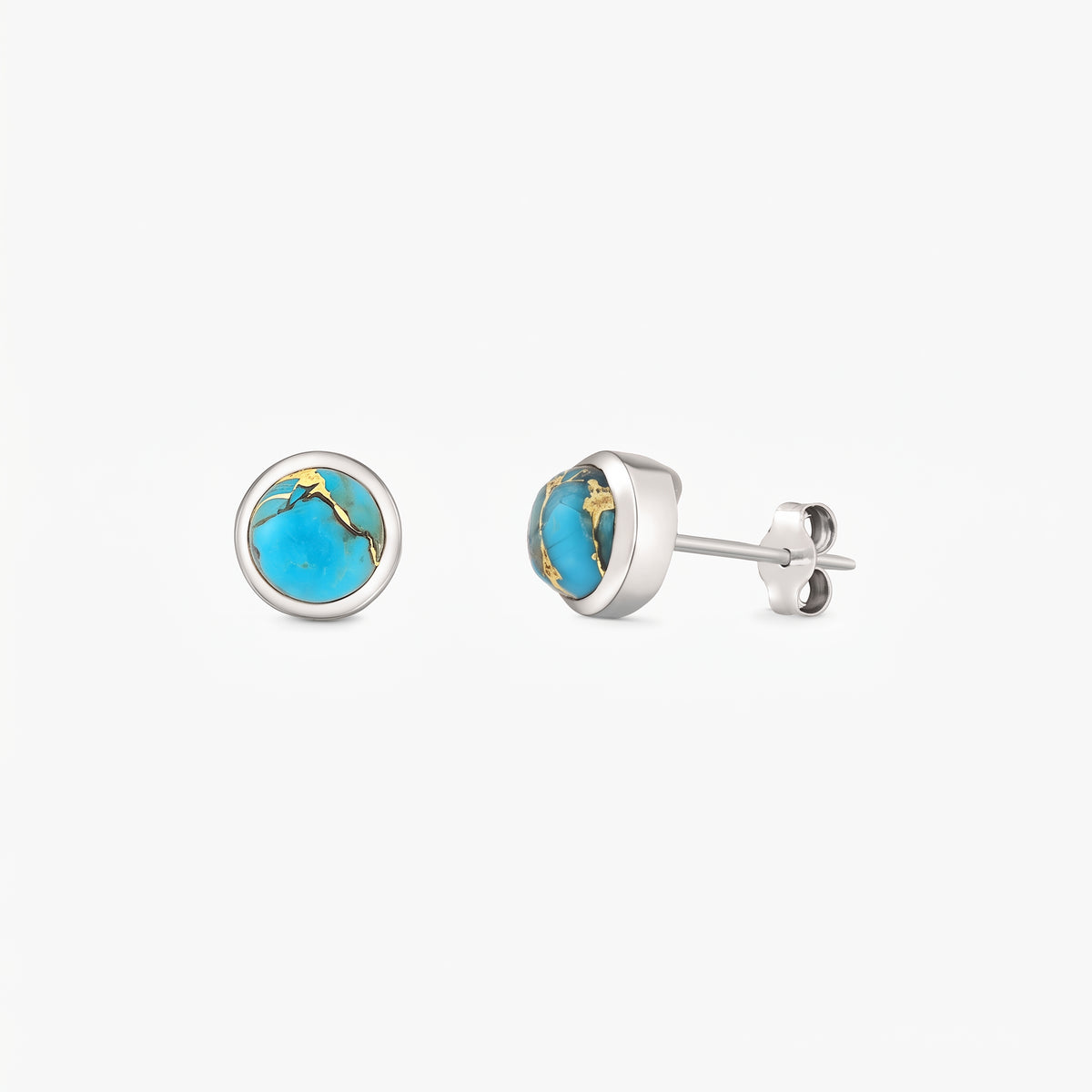 Pair of sterling silver stud earrings with round blue copper turquoise cabochons in bezel settings on a white background.