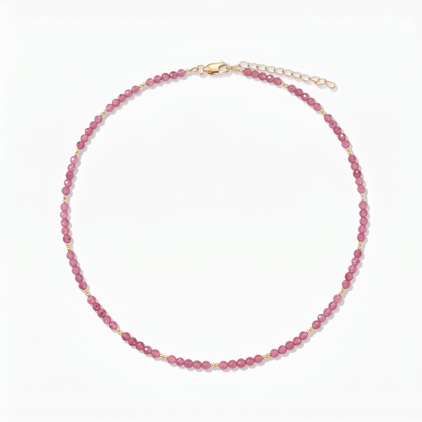 Silver Necklace Golden SummerScape - Tourmaline by Indira: a pink tourmaline beaded necklace with small gold accents and a lobster clasp with extender, on a white background.