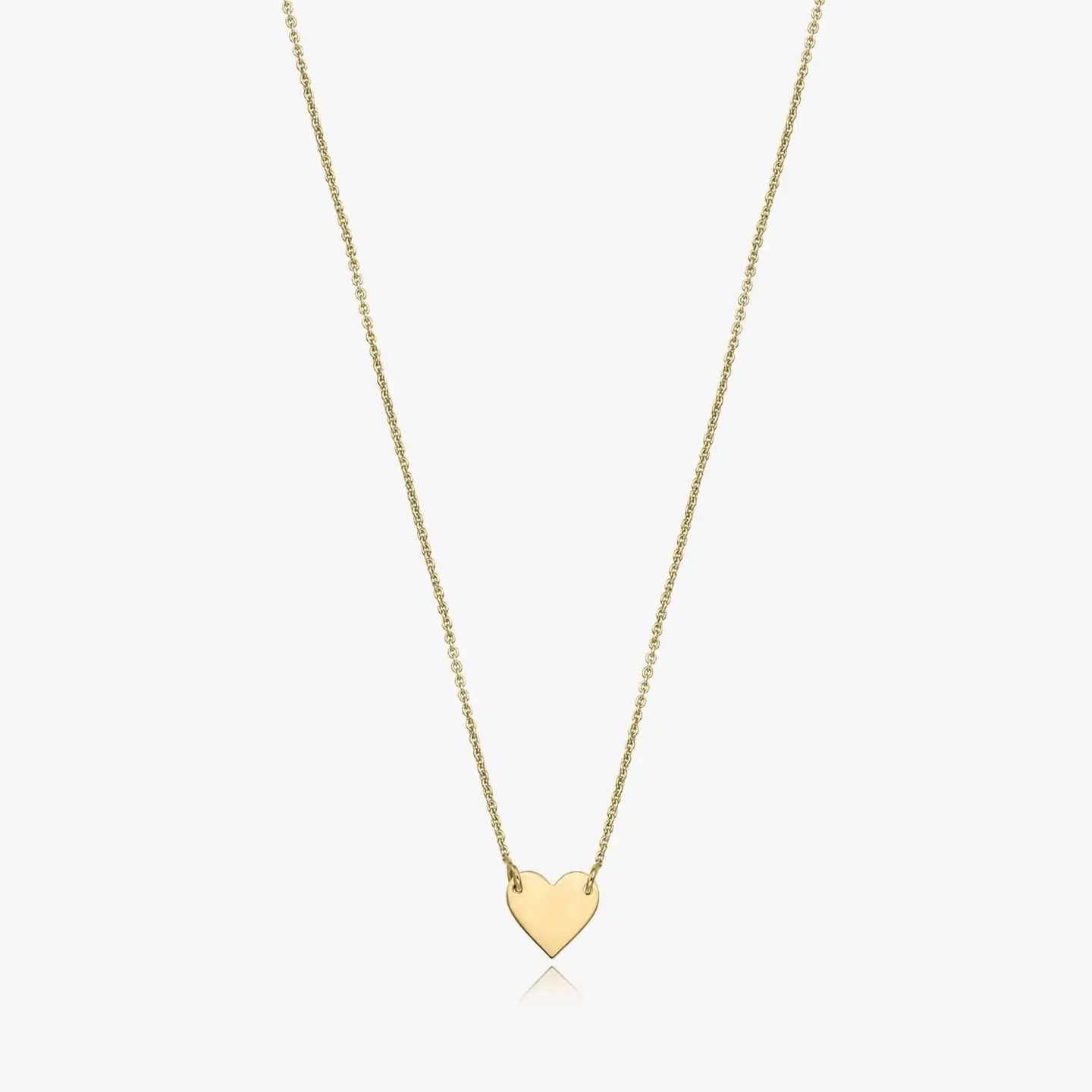 Collier en or 14K avec pendentif en forme de cœur sur fond blanc.
